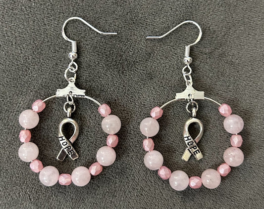 Meaningful “Hope” breast cancer awareness/survivor hoop earrings.